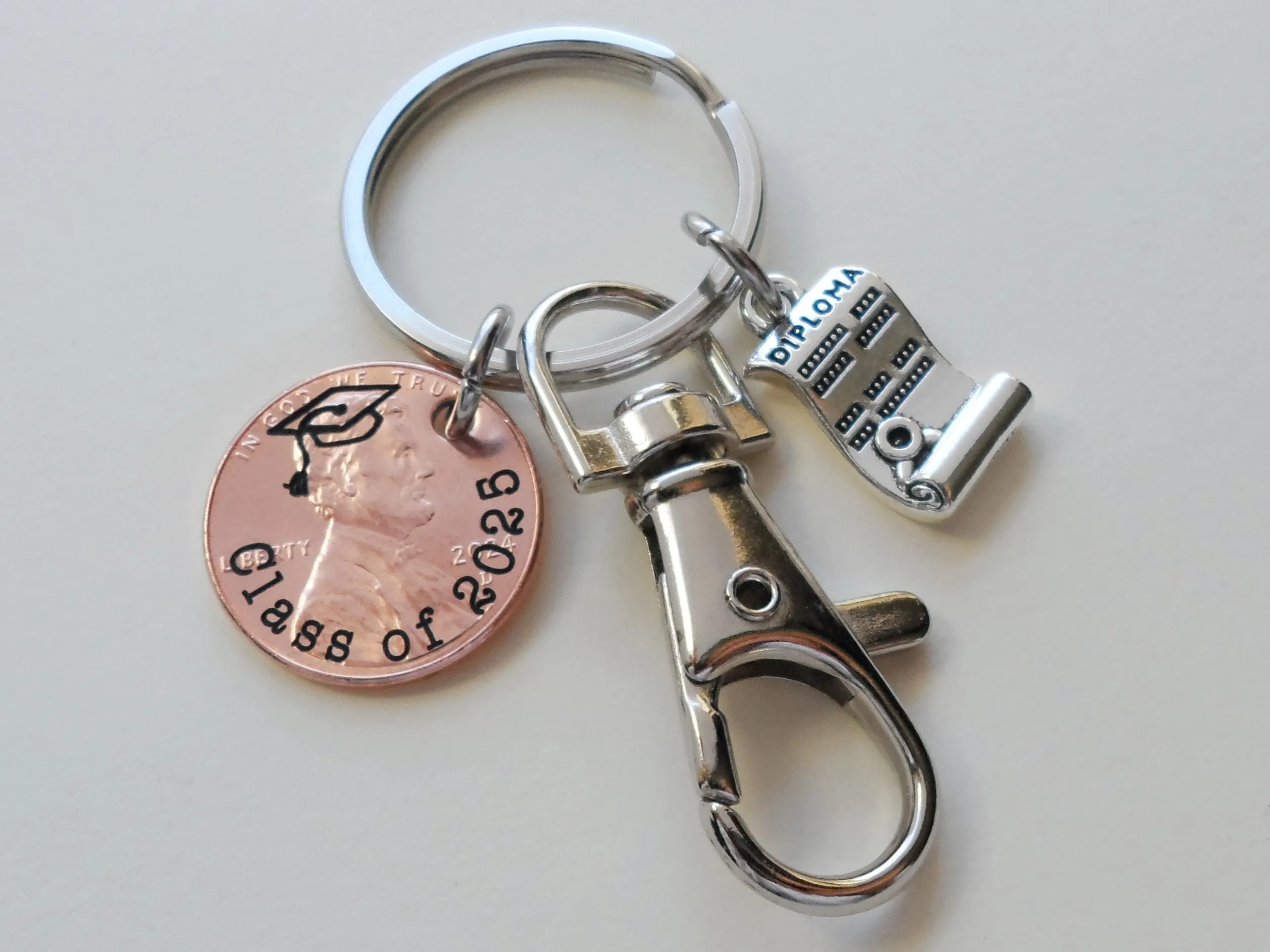 "Class Of 2025" Engraved Penny Keychain with Engraved Graduate Cap & with Graduate Diploma Charm and Clasp